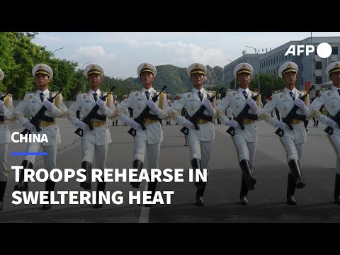 Chinese troops swelter through rehearsal for major military parade | AFP
