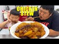 The fat brother picks up his son from school and cooks broiled chicken. The son is relieved!