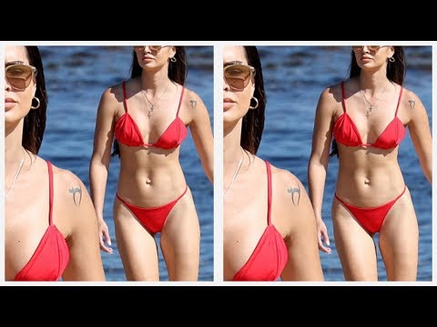 Bachelor star Dasha Gaivoronski flaunts taut abs in skimpy red bikini at the beach