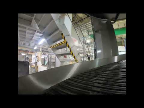 Elévateur à spirale pour  l'ascension ou la descente de manière hélicoïdale de produits en continu_3