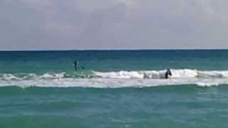 preview picture of video 'Surfers on Dania Beach, Florida at Dania Pier'