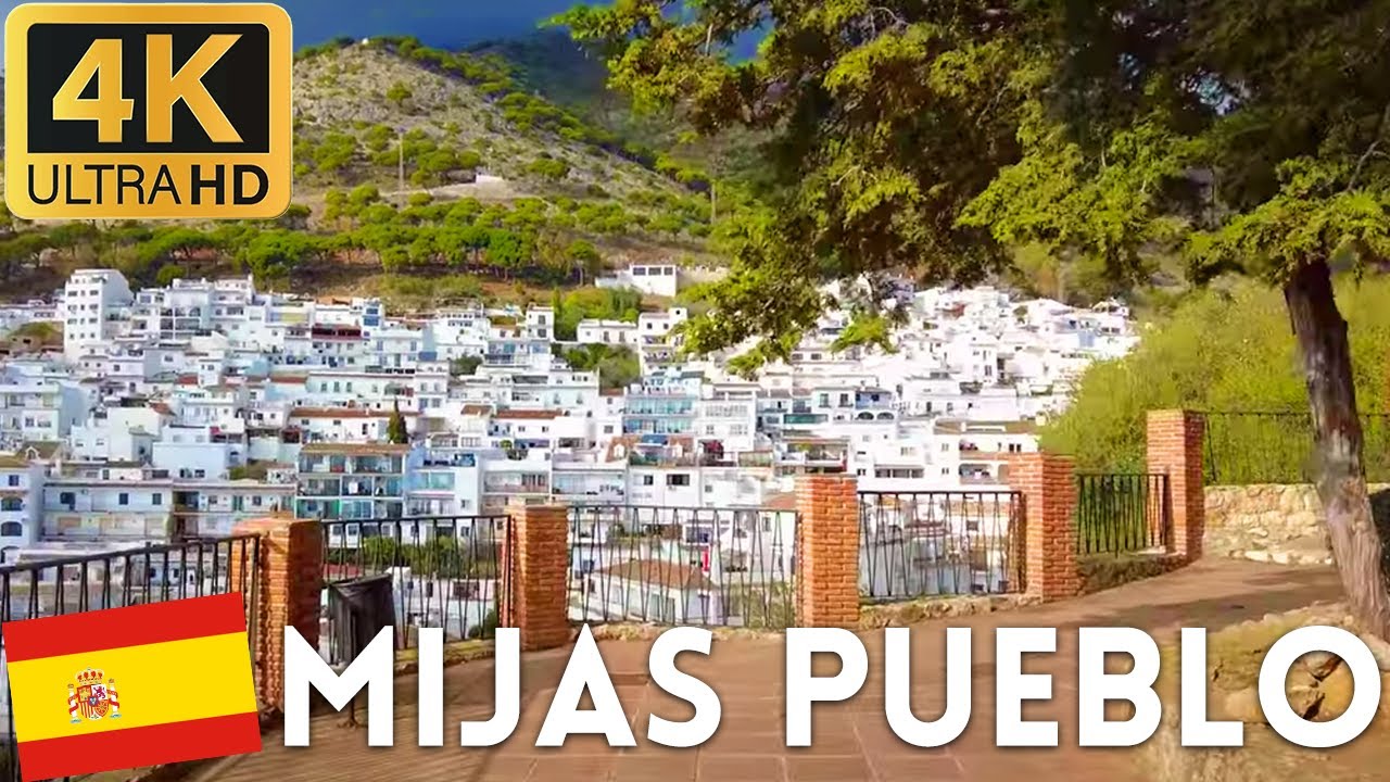 Immersive street-level walking tour through Mijas Pueblo, Spain, showcasing authentic urban landscapes, local architecture, and the vibrant atmosphere of the city's neighborhoods