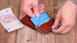 Стильний чоловічий гаманець у три складання Grande Pelle 16786 коричневий