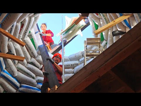 We Install Huge Shou Sugi Ban Timber Posts In The Top Of Our Earthbag Dome