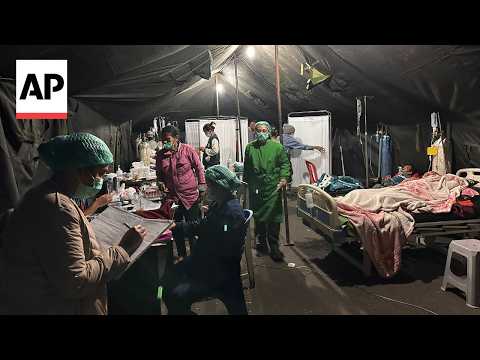 Tents house patients outside hospital after quake hits Indonesia