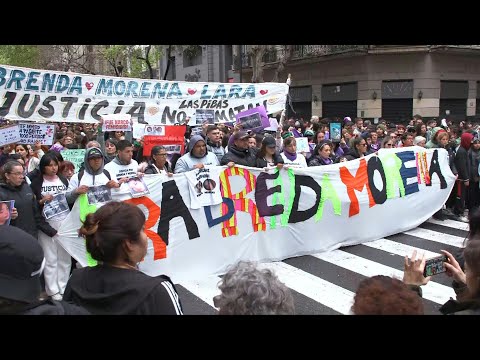Thousands march in Buenos Aires demanding justice for victims of triple femicide | AFP