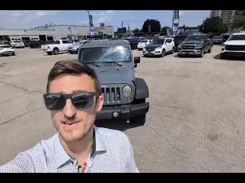 2014 Jeep Wrangler Unlimited 4WD 4dr Sport in Anvil Clear Coat for sale at Kitchener Chrysler Dodge Jeep Ram in Kitchener, ON