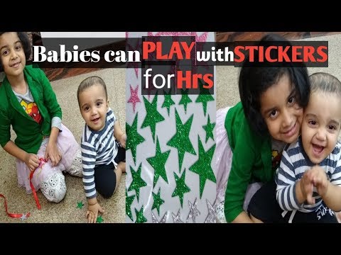 DIY Home made game idea for infant : iffah miggi play with sticker and ribbons