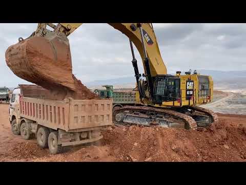 Amazing Caterpillar 6015B Excavator Loading 2 Trucks heavy equipment operator  in construction.