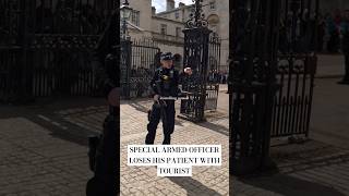 SPECIAL ARMED OFFICER LOSES HIS PATIENCE WITH TOURIST l Horse Guards Royal Horse London armed police