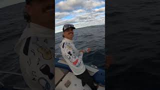 Excited fisherman throws his rod into the ocean!