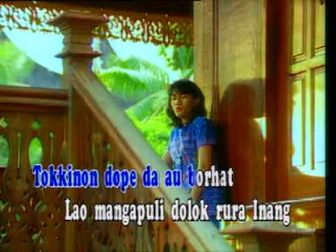 Christine Panjaitan - Di Jou Au Mulak Amang (with caption)