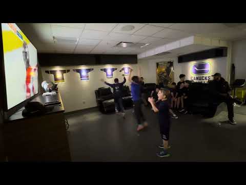 Surrey U11A2 team bonding watching the Canucks shootout