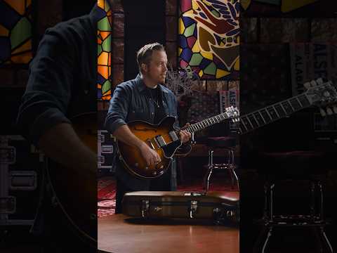 Jason Isbell shows Mark Agnesi his 1961 Gibson ES-335