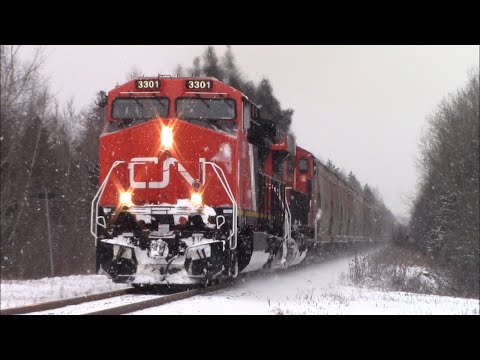 Rebuilt AC44C6M 3301 Leads a Long & Heavy Potash Train CN 596 w/Mid +Rear DPUs at Boundary Creek, NB