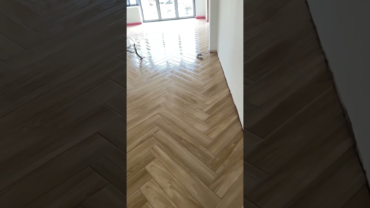 Herringbone floor wood effect tiles