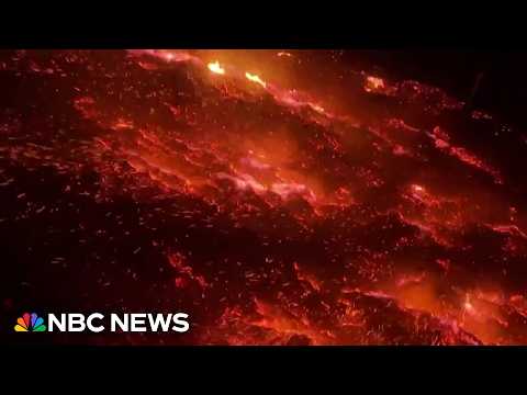 Wildfire burns homes and forces evacuations | NBC News