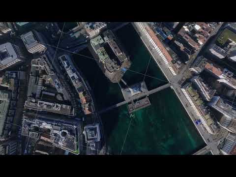 The mouth of the Rhine River in Geneva, view from above. Emerald green waterways, l'Ile island in