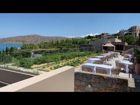 Blue Palace Anthós fusion restaurant with the garden of herbs the clients can see, smell and try.