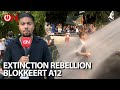 Extinction Rebellion kon met weinig weerstand van de politie de A12 blokkeren in Den Haag