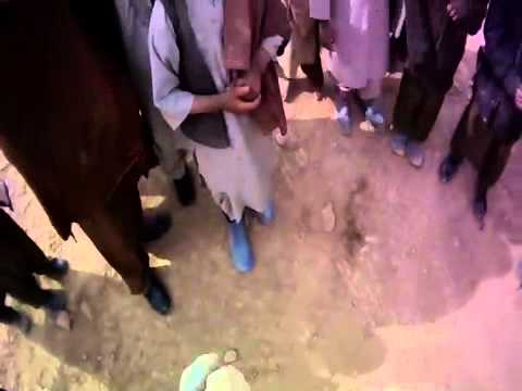 Juggling rocks in Afghanistan.