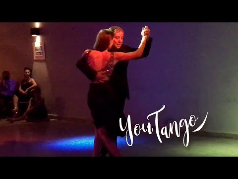  Julio Balmaceda  and  Virginia Vasconi  are  dancing  to  the  milonga  "  La Cicatriz  "  by  Juan D'Arienzo  in  2019
