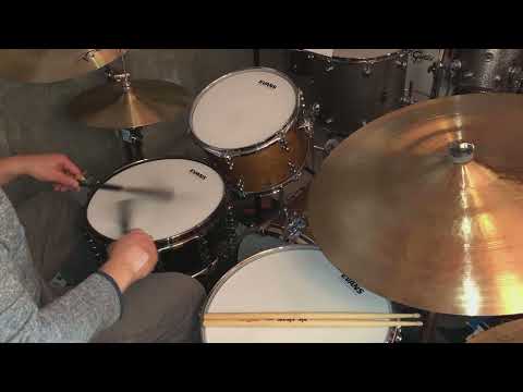 Charley Wilcoxon rolling in rhythm using tap sweeps with brushes
