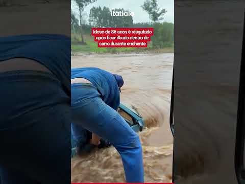 IDOSO DE 86 ANOS É RESGATADO APÓS FICAR ILHADO DENTRO DE CARRO DURANTE ENCHENTE