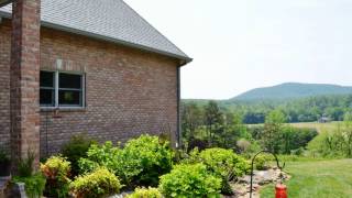 preview picture of video 'Views of Bakers Mtn., acreage, almost new home'