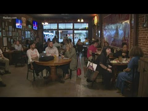 Metro Atlanta residents watch presidential candidates face off in Democratic debate