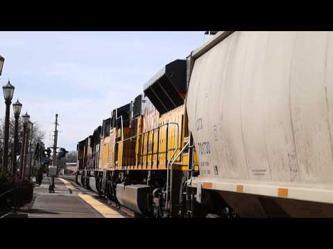UPRR Freight Train With A Bunch Of Empty Flat Cars At Elmhurst Illinois