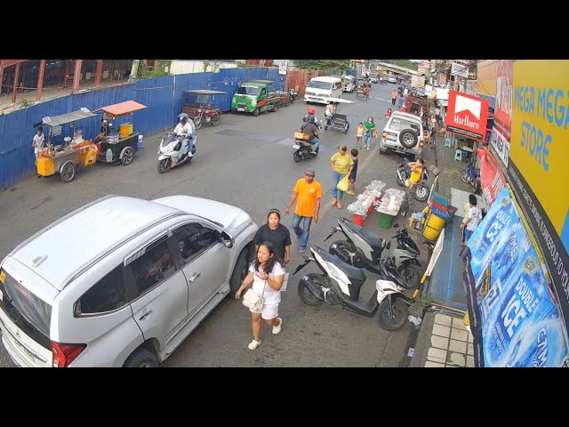 Live webcam view of Zona del mercado de la calle Aquino
