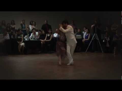  Andrea Misse  and  Javier Rodriguez  are  dancing  to  the  milonga  "  Milonga, Vieja Milonga  "