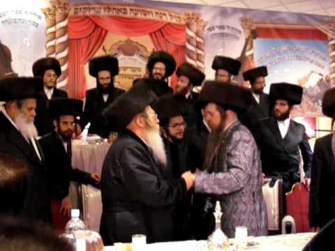 shendishov and kretchnif rebbes dancinng with chosson
