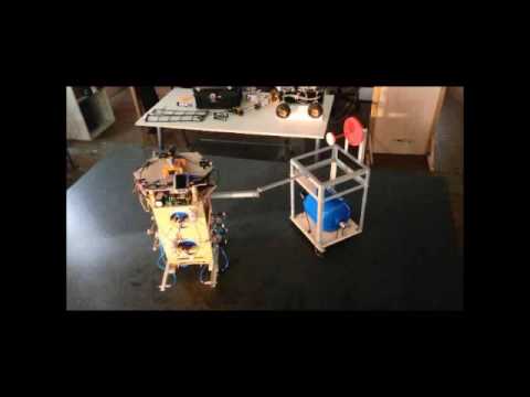 Rest-to-rest control for two spacecraft paired by means of a flexible link