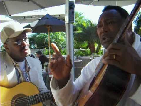 George Benson and Daryl Darden, guitarists.