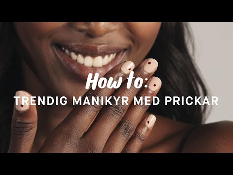 Trendig manikyr med prickar