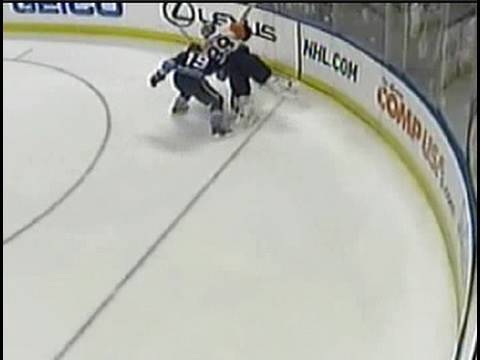 Dominic Moore runs into Rick DiPietro