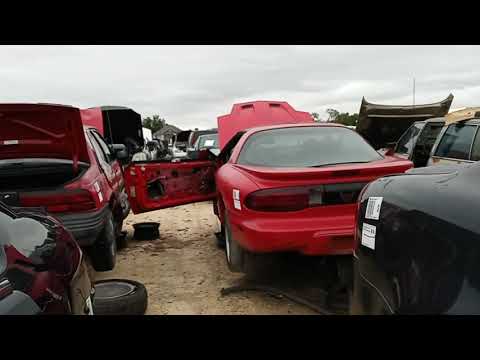 Checking milage in the salvage yard