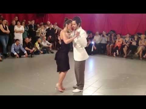  Malika Pitou-Nicolier  and  Haris Mihail  are  dancing  to  a  tango