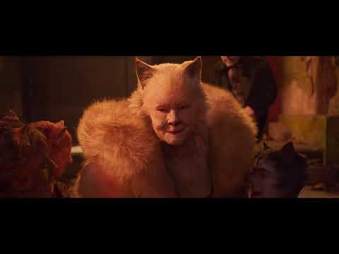 Trailer frame: Grizabella alone beneath a streetlamp, foreshadowing “Memory”