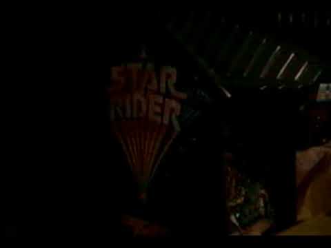 unwrapping a Star Rider Arcade sitdown game