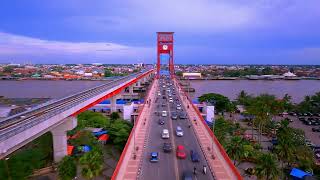 Download lagu Pesona jembatan ampera, masjid agung, dan sungai musi kota palembang dari mata kamera drone FPV mp3