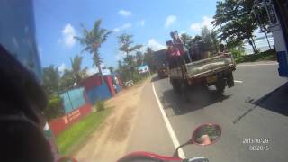 preview picture of video 'Normal road traffic in Sri Lanka + some random bicycle race making more hassle ;)'
