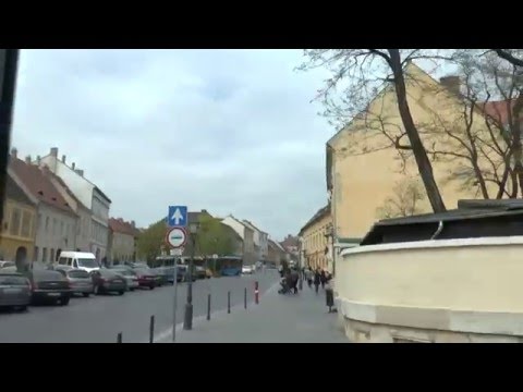 Bus 16 driving in the Castle Hill district of Budapest , Hungary