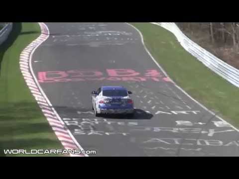 BMW 4 Series Coupe burning rubber on the track nyurberga