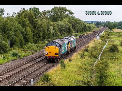 37059 & 37069 pass Lea Marston on a jolly outing for Loram