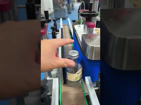 Automatic desktop round bottle labeling machine working video