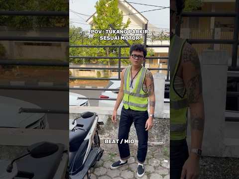 tukang parkir sesuai motor