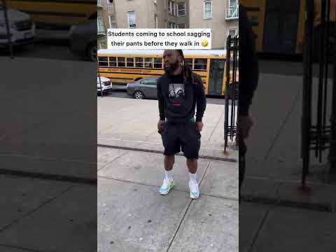Students sagging their pants before going into the school building 🤣